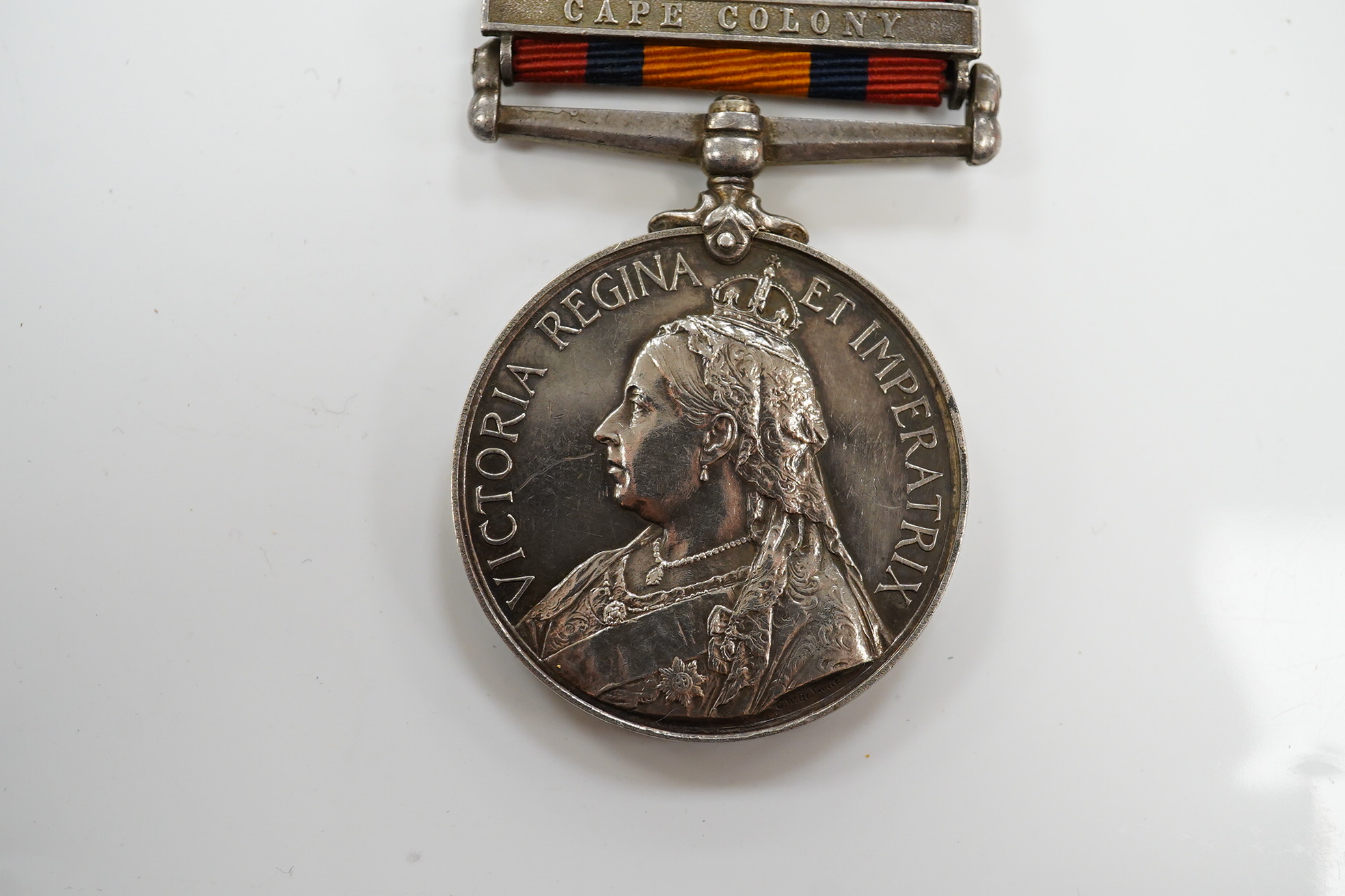 A Victorian South Africa medal awarded to CPL E. Daly RL. DUBLIN FUS. with six bars for Cape Colony, Talana, Tugela Heights, Orange Free State, Relief of Ladysmith and Transvaal. Condition - fair to good